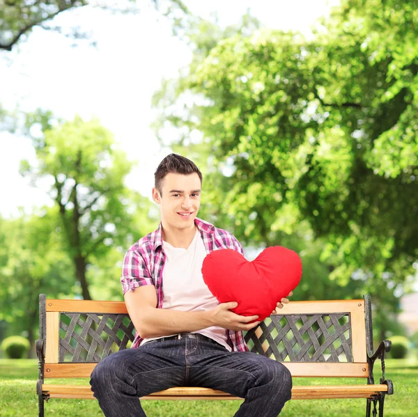 Guy holding red heart — Stock Photo, Image