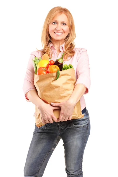 Woman holding paper bag — Stock Photo, Image