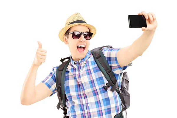 Male tourist taking pictures of himselves — Stock Photo, Image