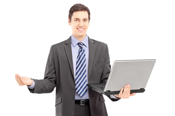 Man in pak met laptop — Stockfoto