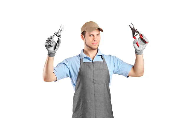 Male gardener holding pliers — Stock Photo, Image