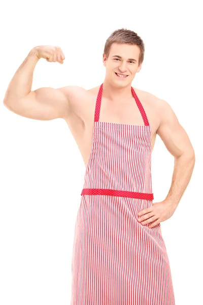 Sexy muscular man wearing a apron — Stock Photo, Image