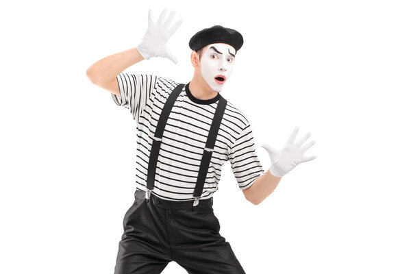 Male mime artist performing