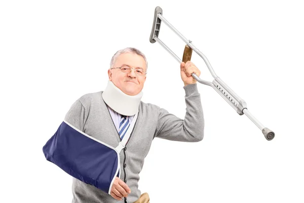 Volwassen gentleman met gebroken arm — Stockfoto