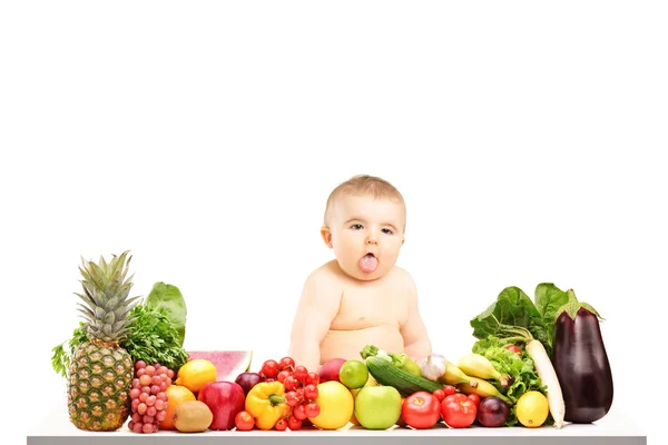 Baby boy sitting on table — Stock Photo, Image