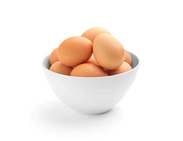Many eggs in porcelain bowl — Stock Photo, Image