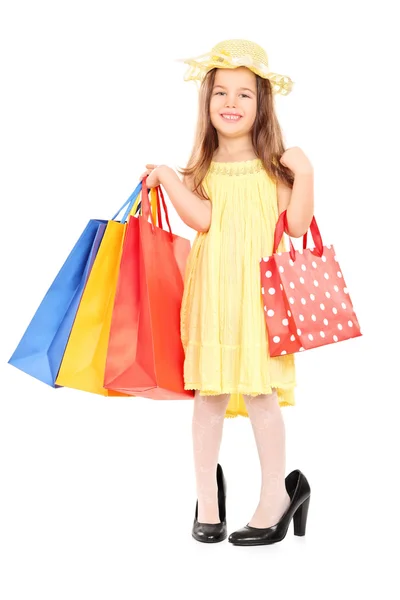 Menina segurando sacos de compras — Fotografia de Stock