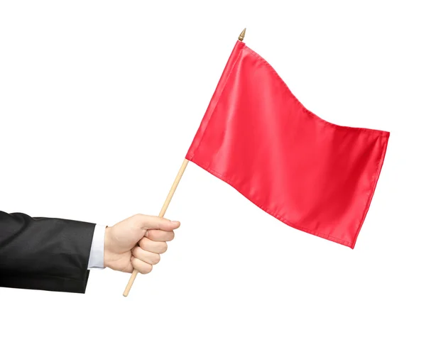 Hand holding red flag — Stock Photo, Image