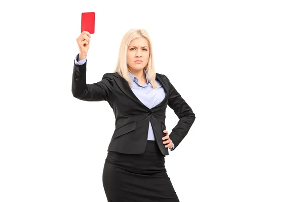 Businesswoman holding red card — Stock Photo, Image