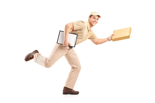 Delivery boy in rush delivering package — Stock Photo, Image