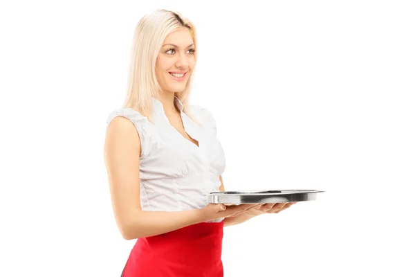 Blond female waitress holding a tray — Stock Photo, Image