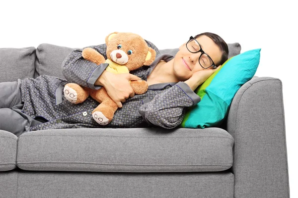 Kille sover på soffan — Stockfoto