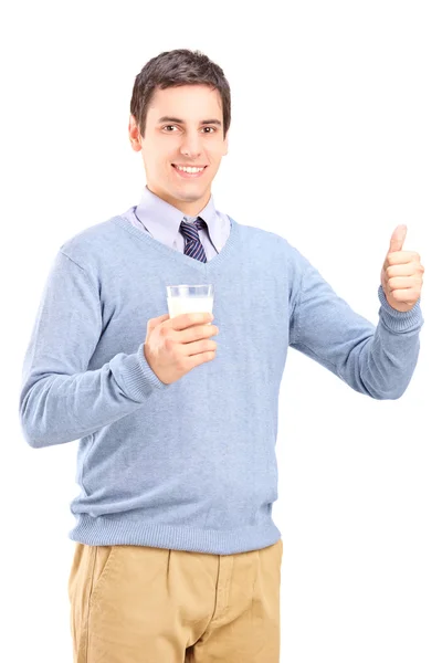 Homem segurando copo de leite — Fotografia de Stock
