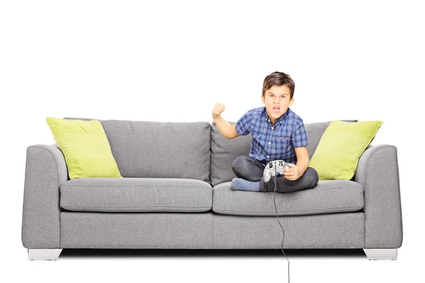 Nervous kid playing video games — Stock Photo, Image