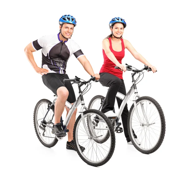 Male and female bikers on bike — Stock Photo, Image