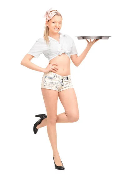 Waitress holding an empty tray — Stock Photo, Image