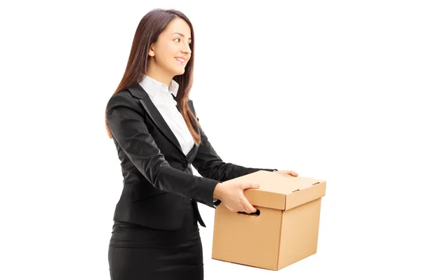 Busineewoman giving box to someone — Stock Photo, Image
