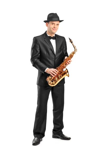 Man holding saxophone — Stock Photo, Image