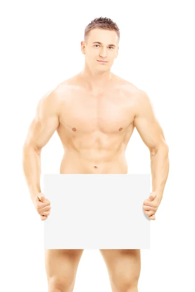 Naked guy holding blank panel — Stock Photo, Image