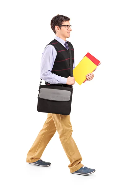 Student walking with notebooks — Stock Photo, Image