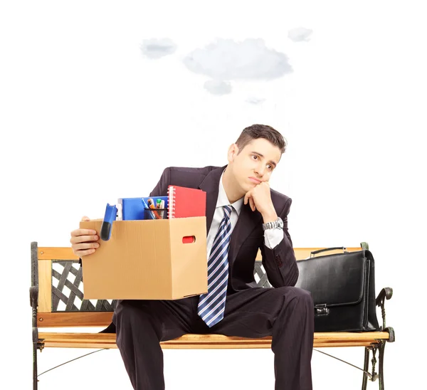 Sad businessman holding box — Stock Photo, Image