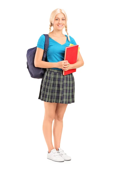 Female student holding books — Stock Photo, Image