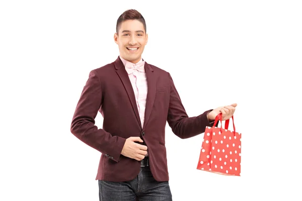 Homem segurando saco de compras — Fotografia de Stock