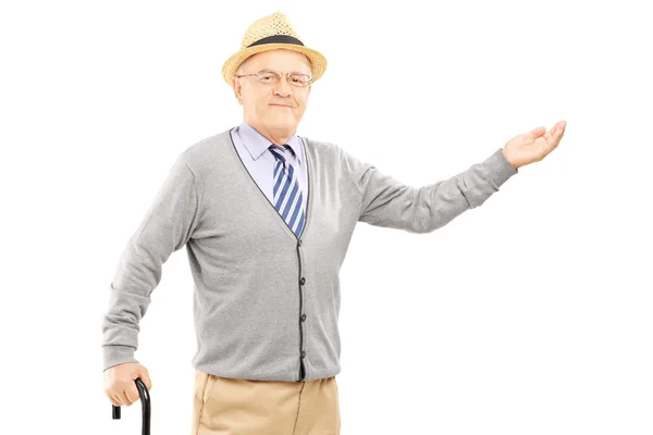 Man with cane gesturing with hand — Stock Photo, Image