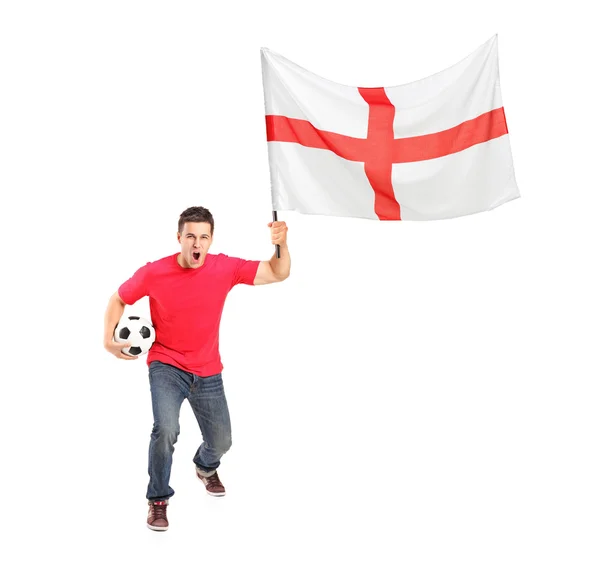 Wentylator euforii, trzymając piłkę i flaga — Zdjęcie stockowe