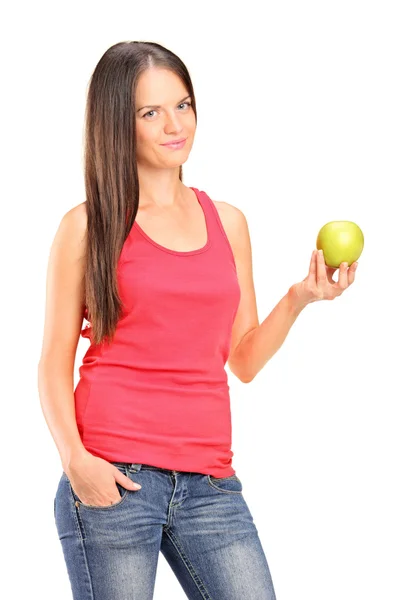 Schöne Frau mit einem Apfel in der Hand — Stockfoto