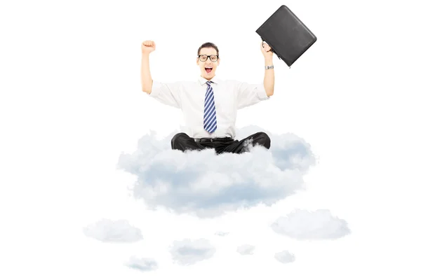 Biznesmen jedzie na chmury — Zdjęcie stockowe