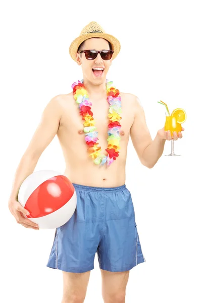 Male holding beach ball Royalty Free Stock Images