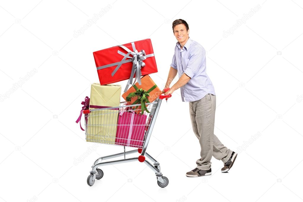 Man pushing shopping cart with gifts
