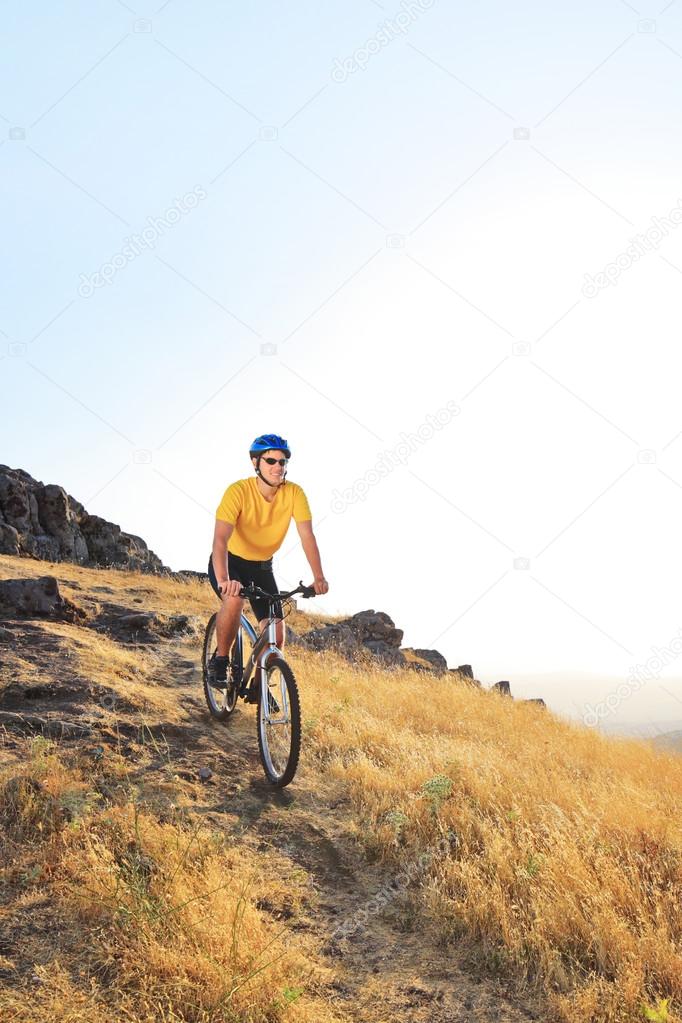 Biker riding mountain bike