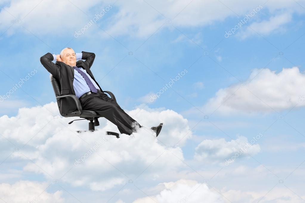 Businessman resting in armchair