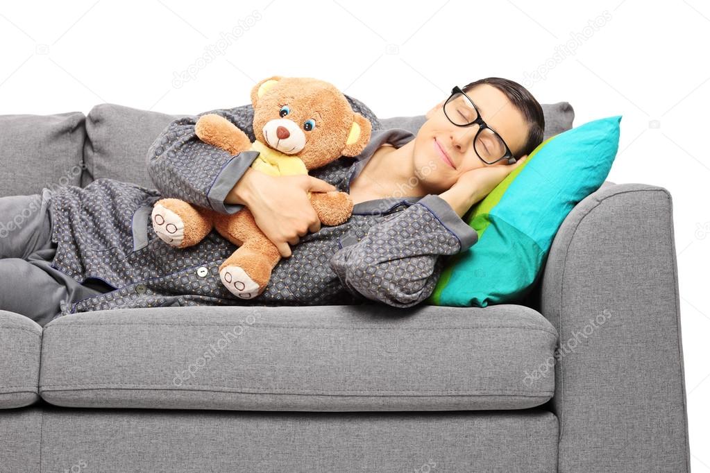 Guy sleeping on sofa