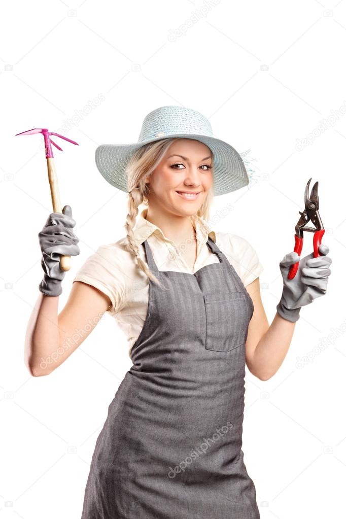 Female gardener with gardening tools