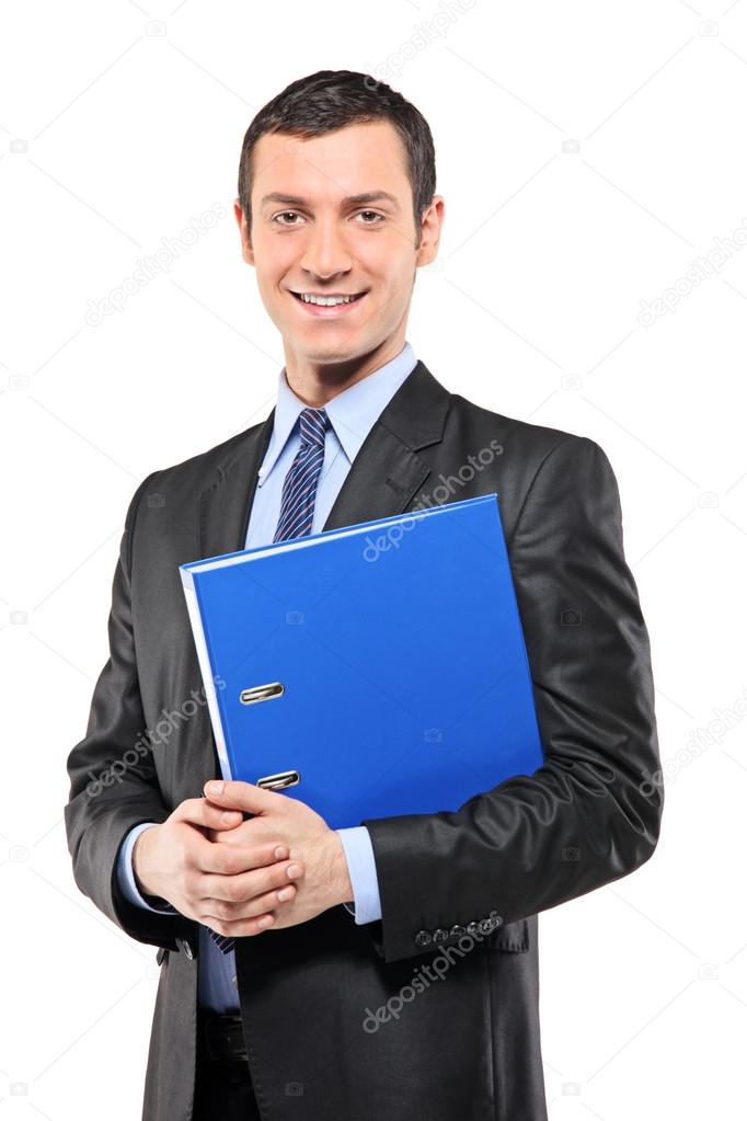 Businessman holding fascicule