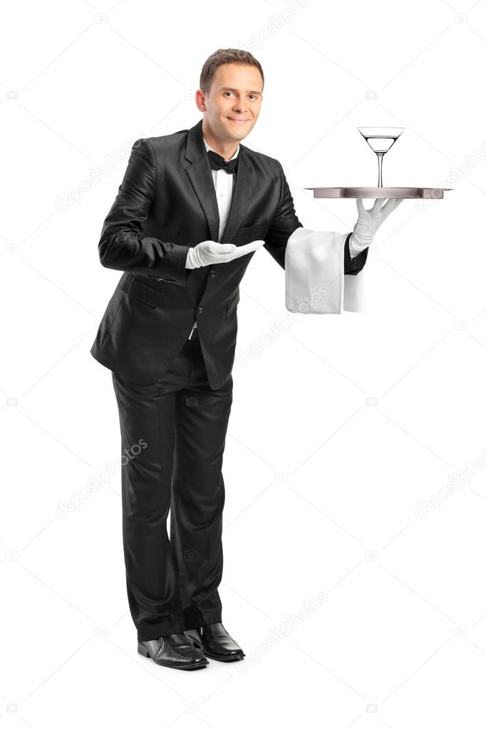 Waiter holding tray with glass