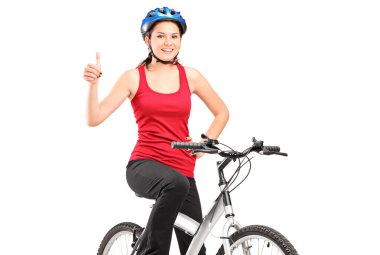 bir bisikletçi Bisikletin üstünde poz ve baş parmak pes