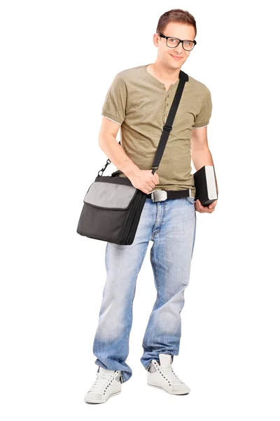 Male student holding book — Stock Photo, Image