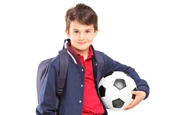 Estudante segurando bola de futebol — Fotografia de Stock