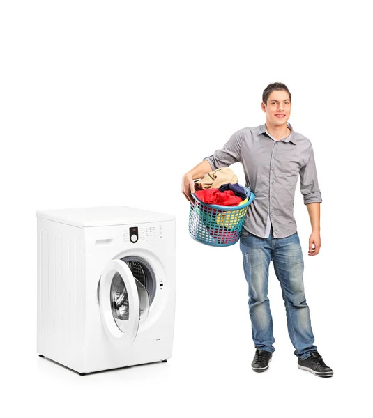 Male holding laundry — Stock Photo, Image