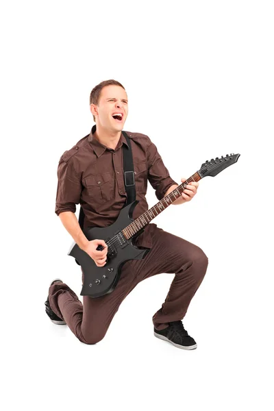 Rock star playing guitar — Stock Photo, Image