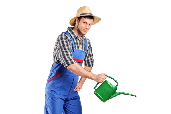 Manliga trädgårdsmästare med vattenkanna — Stockfoto