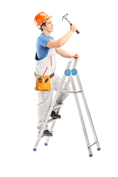 Repairman on ladder — Stock Photo, Image