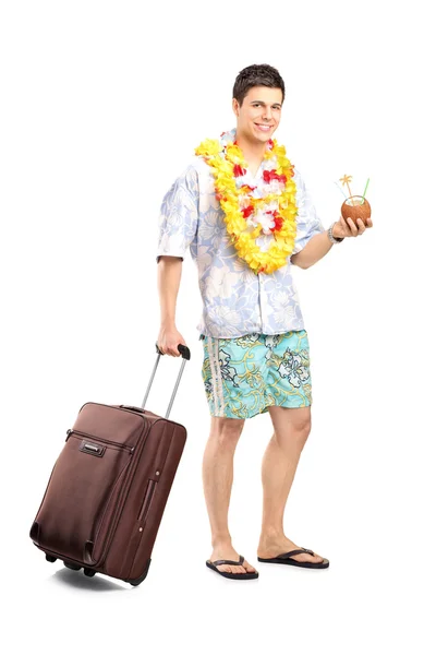 Homme avec cocktail portant des bagages — Photo
