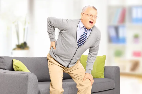 Senior man suffering from back pain — Stock Photo, Image