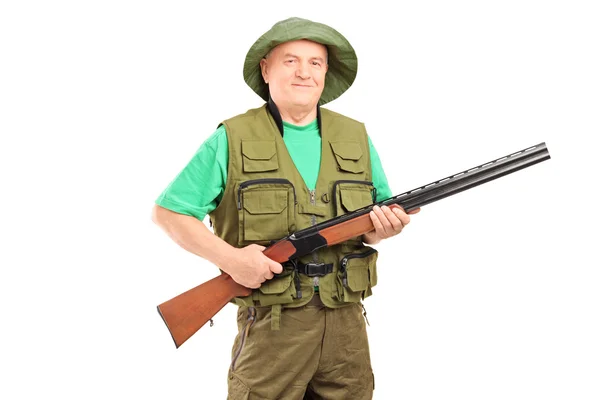 Mature male hunter holding rifle — Stock Photo, Image