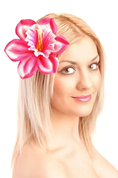 Blond woman posing with flower — Stock Photo, Image